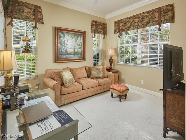 carpeted living room with a healthy amount of sunlight and crown molding