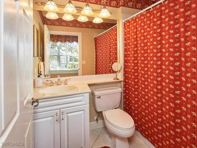 full bathroom featuring vanity, toilet, and tile patterned floors