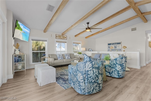 living room with vaulted ceiling with beams, light hardwood / wood-style floors, and ceiling fan