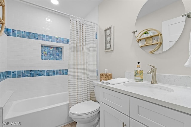 full bathroom with vanity, toilet, and shower / bathtub combination with curtain