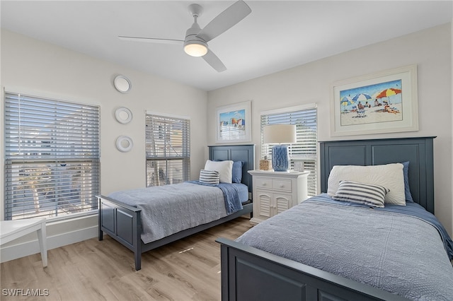 bedroom featuring ceiling fan and light wood-type flooring