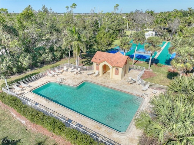 view of swimming pool featuring a patio area