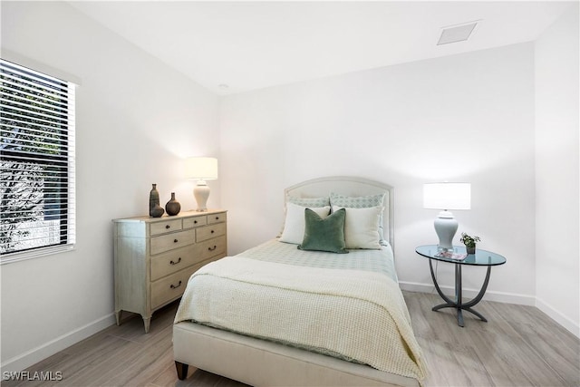 bedroom featuring light hardwood / wood-style flooring