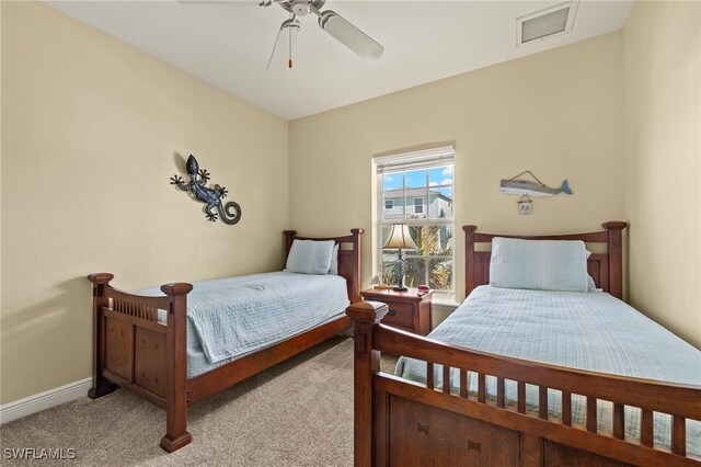 241 Pearl St, Fort Myers Beach, FL 33931 - bedroom with visible vents, baseboards, carpet, and a ceiling fan
