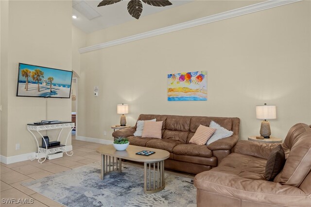 241 Pearl St, Fort Myers Beach, FL 33931 - tiled living room featuring a high ceiling, baseboards, and ceiling fan
