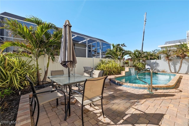 241 Pearl St, Fort Myers Beach, FL 33931 - view of pool with a fenced backyard, a pool, outdoor dining area, a lanai, and a patio area