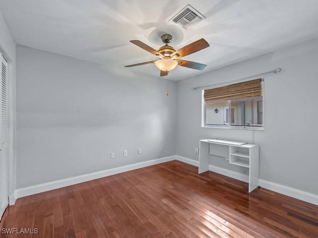 interior space with ceiling fan and hardwood / wood-style floors