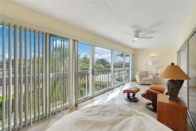 sunroom / solarium with ceiling fan