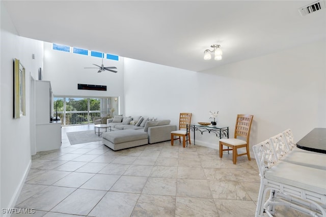 living room featuring ceiling fan