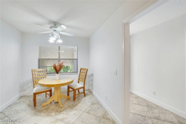 dining area with ceiling fan