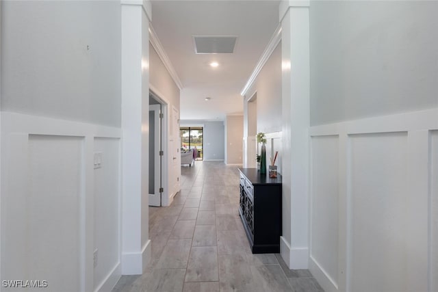 corridor with crown molding