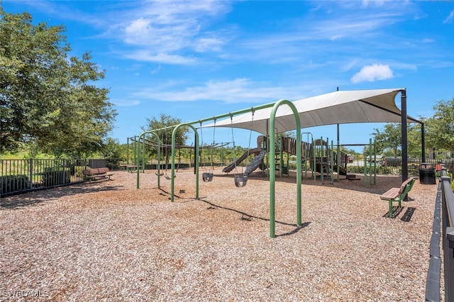 community playground featuring fence