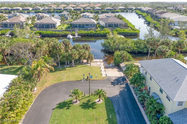 birds eye view of property featuring a water view