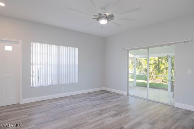 unfurnished room with light hardwood / wood-style floors and ceiling fan