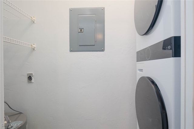 clothes washing area featuring electric panel