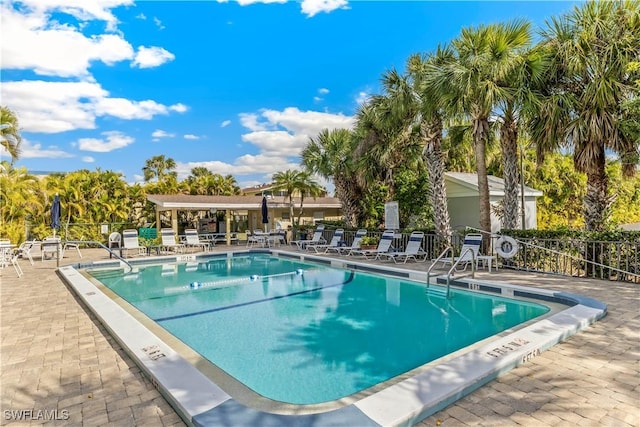 view of swimming pool featuring a patio area