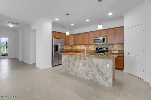 kitchen featuring stainless steel appliances, backsplash, an island with sink, pendant lighting, and ornamental molding