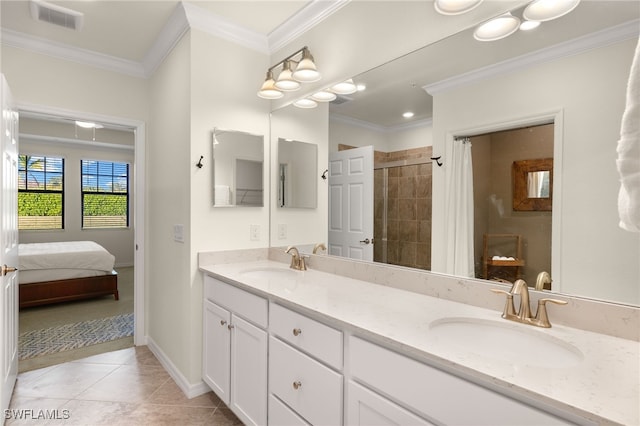 bathroom featuring tile patterned flooring, a shower, vanity, and ornamental molding