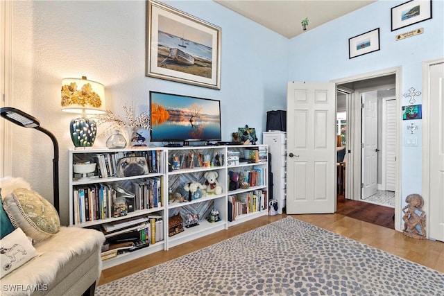 living area featuring hardwood / wood-style flooring