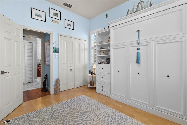 2270 Palo Duro Blvd, North Fort Myers, FL 33917 - bedroom featuring light wood-style floors and two closets
