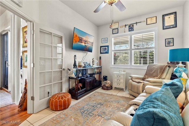 2270 Palo Duro Blvd, North Fort Myers, FL 33917 - tiled living room with a ceiling fan