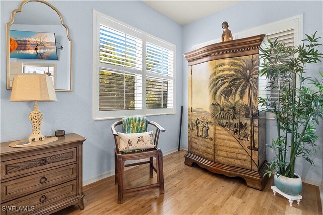 2270 Palo Duro Blvd, North Fort Myers, FL 33917 - sitting room with light wood-style floors and baseboards