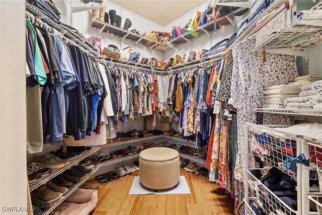 2270 Palo Duro Blvd, North Fort Myers, FL 33917 - walk in closet featuring wood finished floors