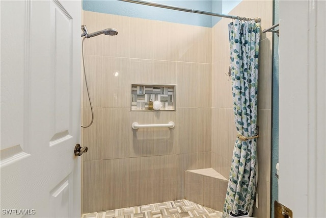 bathroom with a shower with shower curtain