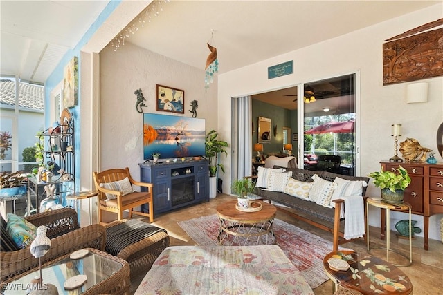 2270 Palo Duro Blvd, North Fort Myers, FL 33917 - living area featuring lofted ceiling and a fireplace