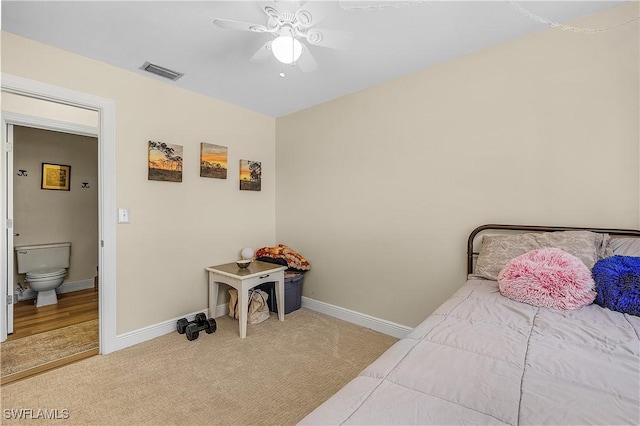 bedroom featuring ceiling fan and light colored carpet