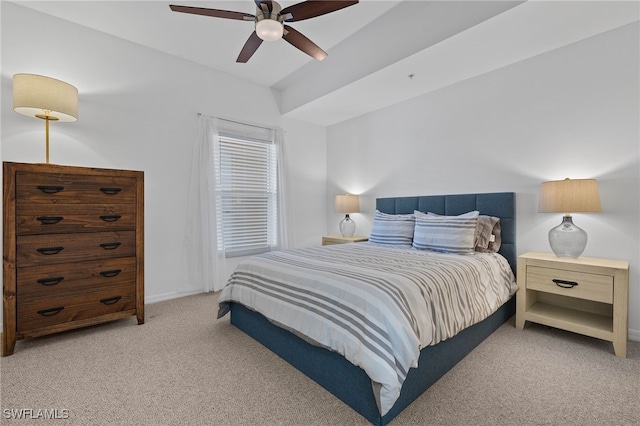 bedroom featuring light carpet and ceiling fan