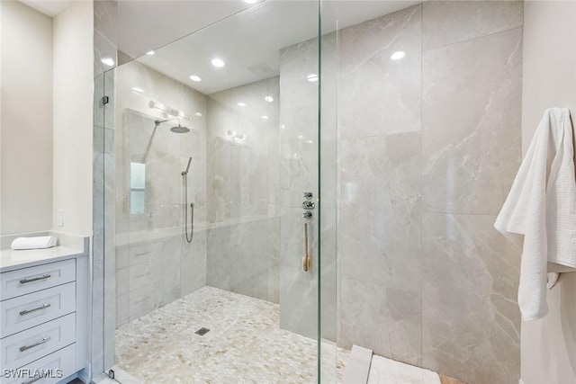 bathroom with tiled shower