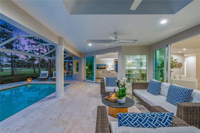 view of swimming pool with ceiling fan