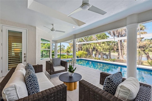 view of patio / terrace featuring an outdoor living space and ceiling fan