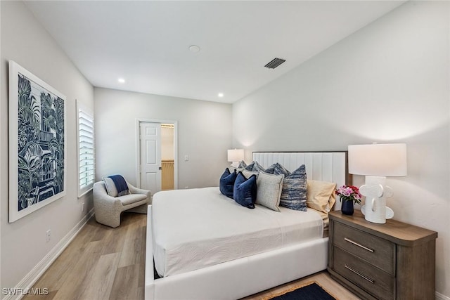 bedroom with light wood-type flooring