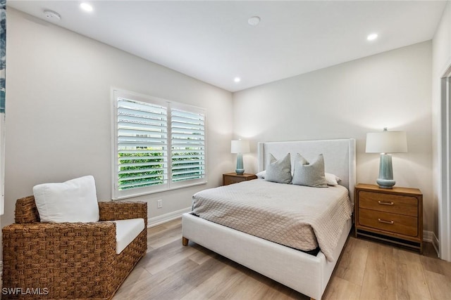 bedroom featuring light hardwood / wood-style flooring