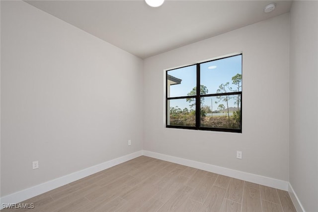 empty room with light wood-type flooring