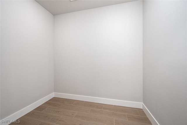 spare room featuring hardwood / wood-style floors