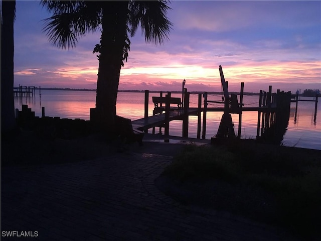 view of dock with a water view