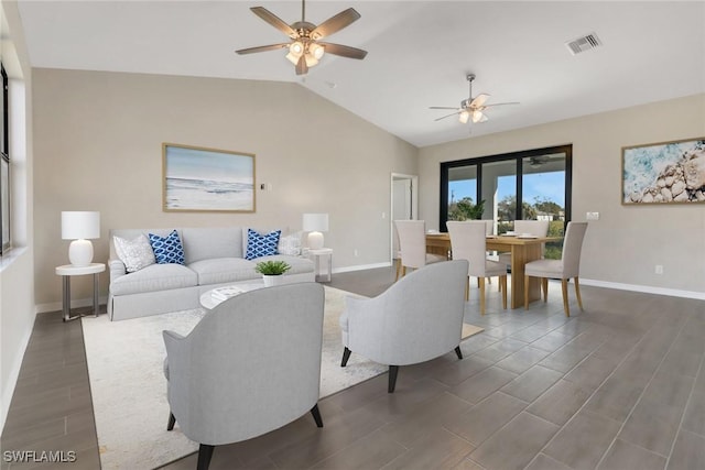 living room featuring ceiling fan and lofted ceiling