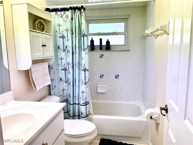 full bathroom featuring shower / tub combo with curtain, vanity, and toilet