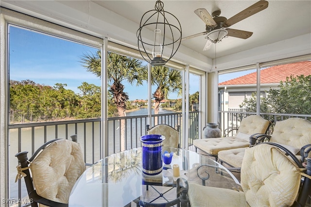 10801 Crooked River Rd Unit 203, Estero, FL 34135 - sunroom with a water view and ceiling fan