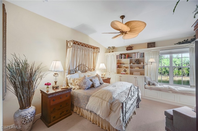 10801 Crooked River Rd Unit 203, Estero, FL 34135 - bedroom with light carpet, vaulted ceiling, and ceiling fan