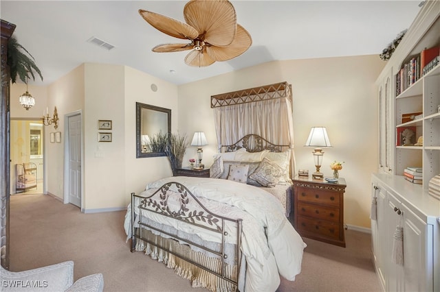 10801 Crooked River Rd Unit 203, Estero, FL 34135 - bedroom featuring light carpet, a ceiling fan, visible vents, and baseboards
