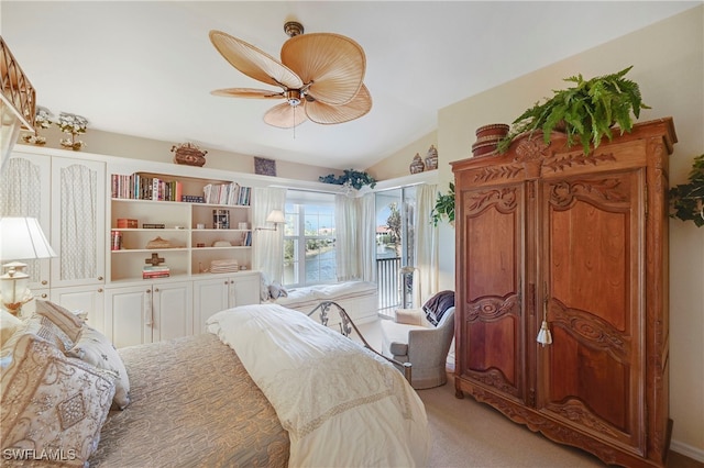 10801 Crooked River Rd Unit 203, Estero, FL 34135 - bedroom with access to exterior, carpet flooring, vaulted ceiling, and a ceiling fan