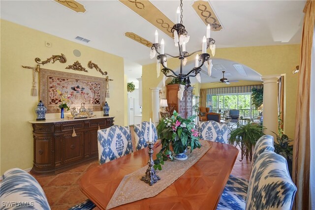 10801 Crooked River Rd Unit 203, Estero, FL 34135 - dining room featuring arched walkways, tile patterned flooring, ceiling fan with notable chandelier, visible vents, and decorative columns