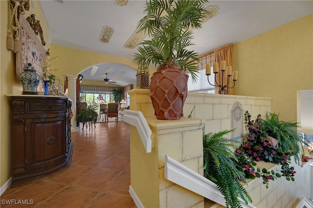 10801 Crooked River Rd Unit 203, Estero, FL 34135 - interior space with ceiling fan and arched walkways