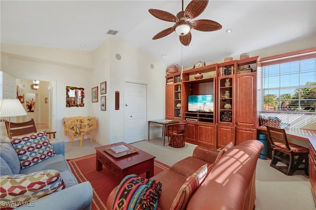 10801 Crooked River Rd Unit 203, Estero, FL 34135 - living room with light carpet, visible vents, a ceiling fan, and lofted ceiling