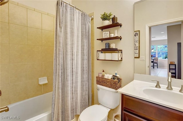 full bathroom featuring shower / bath combination with curtain, vanity, and toilet