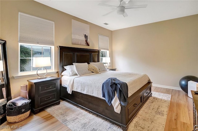 bedroom featuring ceiling fan and light hardwood / wood-style floors